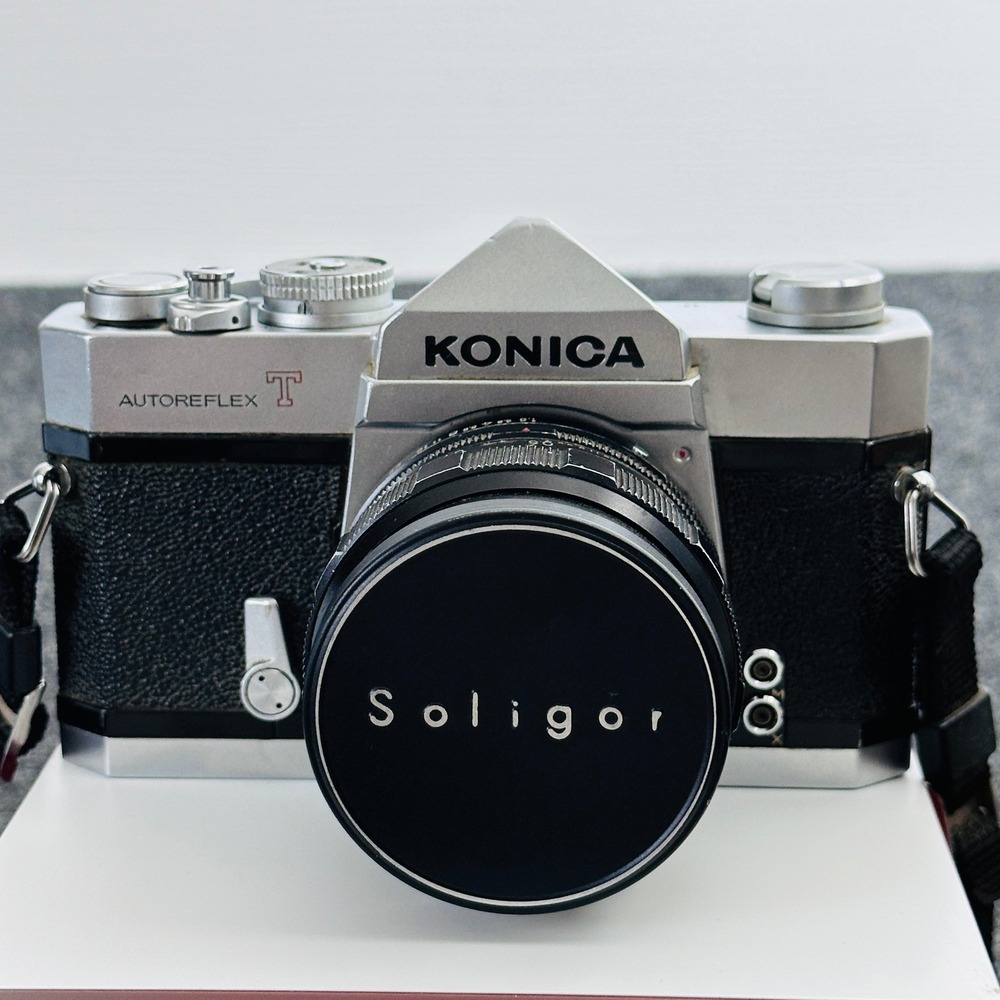 Konica Autoreflex T 35mm SLR Film Camera with Soligor Lens Silver Black UNTESTED